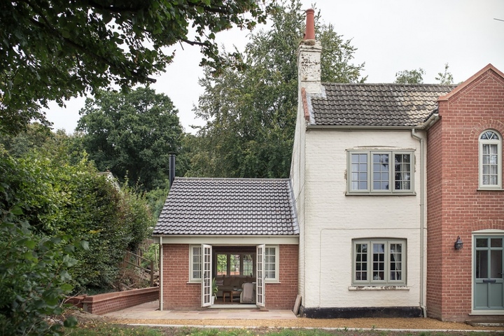 Garden Room with Exposed Beams and French Windows