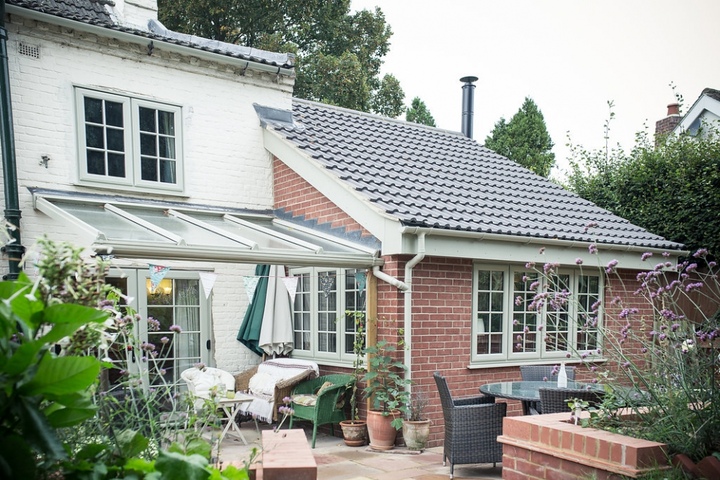 Garden Room with Exposed Beams and French Windows