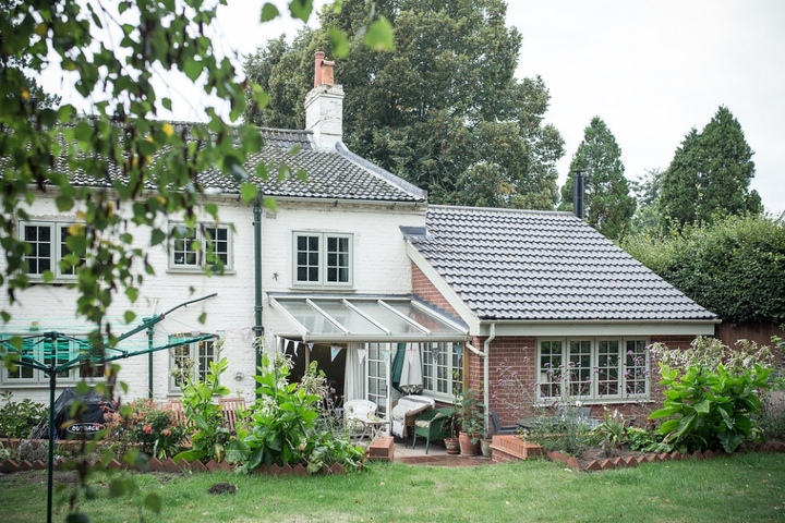 Garden Room with Exposed Beams and French Windows