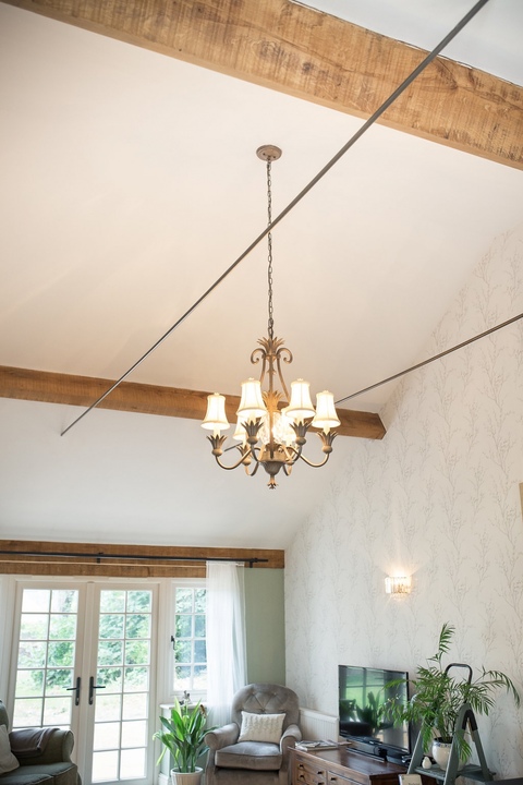 Garden Room with Exposed Beams and French Windows