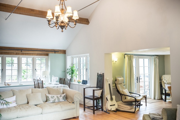 Garden Room with Exposed Beams and French Windows