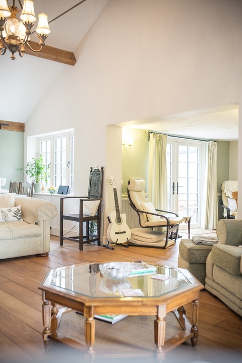 Garden Room with Exposed Beams and French Windows