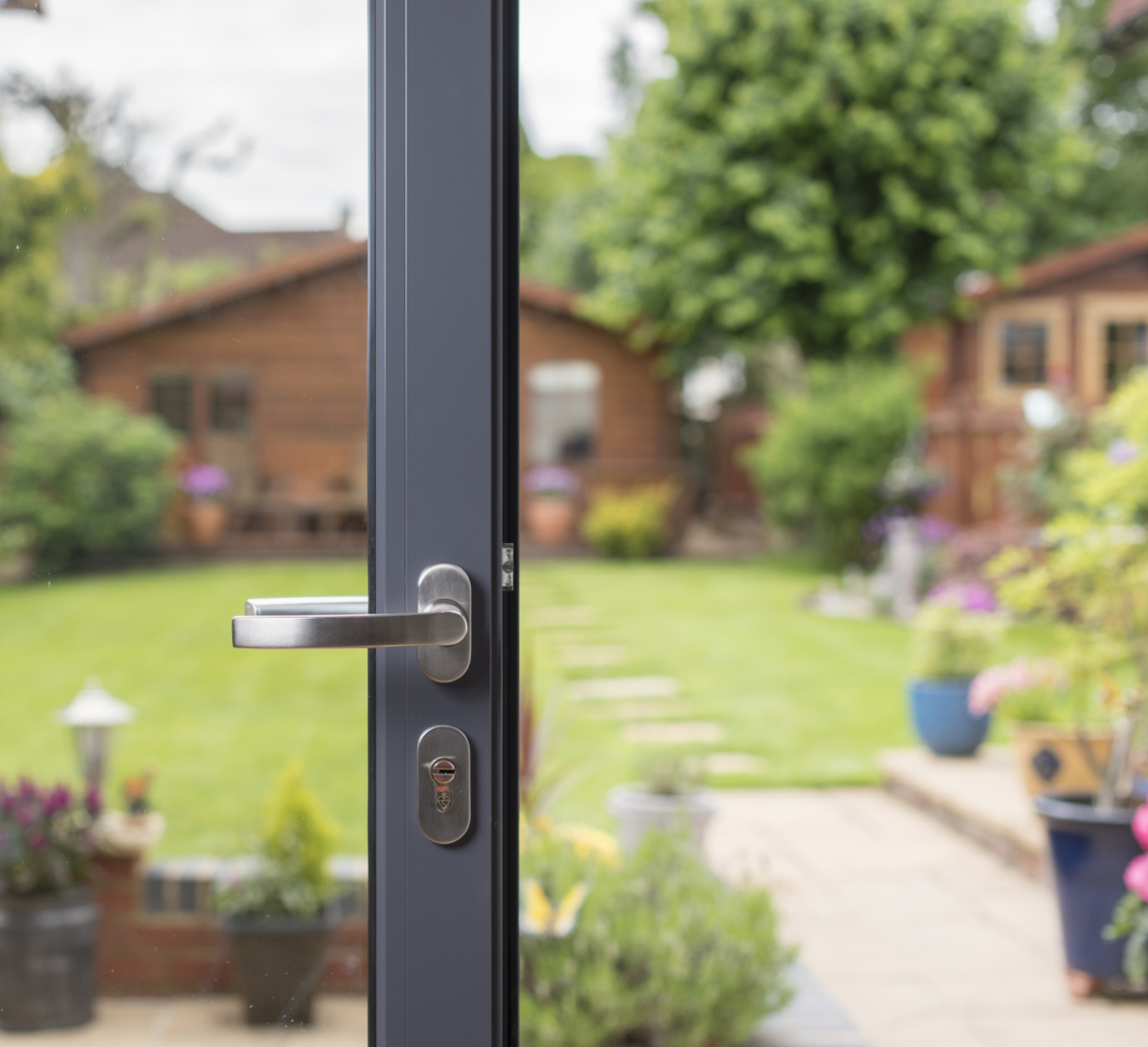 Origin Bi-fold Doors, in grey, handle detail